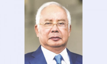 নাজিব রাজাকের সাজা অর্ধেক কমল