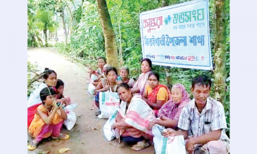 শেরপুরে বন্যার্ত ক্ষুদ্র নৃগোষ্ঠীদের খাদ্য সহায়তা