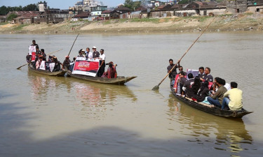 জীবাশ্ম জ্বালানি প্রকল্প সম্প্রসারণ বন্ধের দাবিতে সিলেটে নৌ সমাবেশ