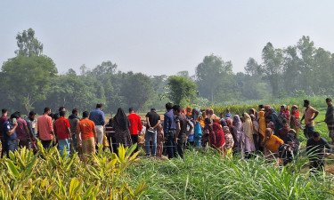 হাত বাঁধা অবস্থায় ধান ক্ষেতে পড়ে ছিল আদিবাসী নারীর মরদেহ