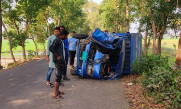 ডাকাতির সময় কাভার্ড ভ্যানের চাপায় এক সদস্যের মৃত্যু