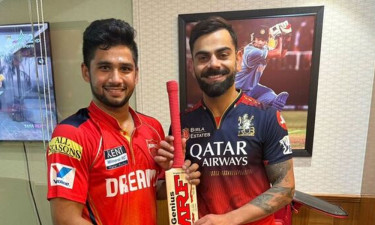 আইপিএলে কোনো ম্যাচ না খেলেও উপহার পেলেন কোহলির ব্যাট, তিনি কে?