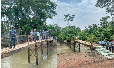 পাথরঘাটায় ভেঙে যাওয়া বেড়িবাঁধে নৌবাহিনীর সহায়তায় সাঁকো নির্মাণ