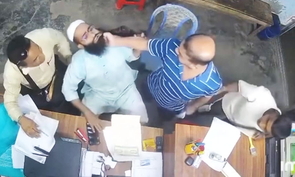 দাড়ি ধরে ব্যবসায়ীকে মারধর, ভিডিও ভাইরাল