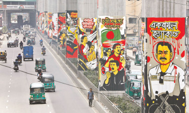 রাজপথে প্রতিরোধের রঙে দেয়ালে আঁকা ইতিহাস
