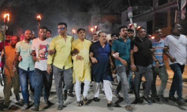 নওগাঁয় বিএনপির মশাল মিছিল