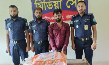 কুকুরের সঙ্গে ধাক্কায় রাস্তায় ছড়িয়ে পড়ে গাঁজা, ব্যবসায়ী আটক