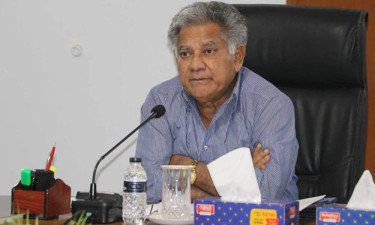 বন্দর উন্নয়নে সিঙ্গাপুরকে বিনিয়োগের আহ্বান নৌ উপদেষ্টার