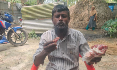 কাঁচা মাংস খেতেই ভালোবাসেন দিনমজুর ইদু মোহাম্মদ