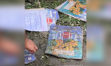 পড়ে আছে বিমান বিধ্বস্তে হতাহত শিক্ষার্থীদের বই-খাতা