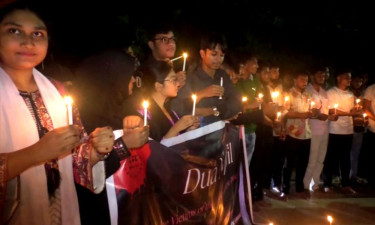 নিহতদের স্মরণে গোপালগঞ্জে মোমবাতি প্রজ্বলন ও মৌন মিছিল