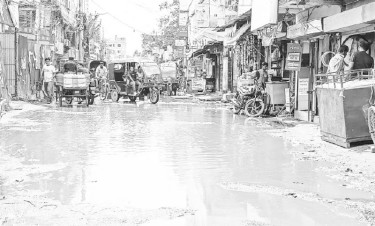 খানাখন্দে ভরা সড়ক, জলাবদ্ধতা