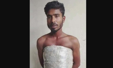 শরীরে স্কচটেপ পেঁচিয়ে গাঁজা পাচারের সময় একজন আটক