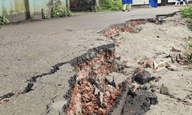 পুকুরে ভেঙে পড়ছে পাকা সড়ক, ঝুঁকিতে চলাচল