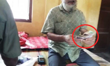 ঘুষের টাকা গুনতে গুনতে ভূমি কর্মকর্তা বললেন, এক মাসে কাজ কমপ্লিট করে দেওয়া হবে